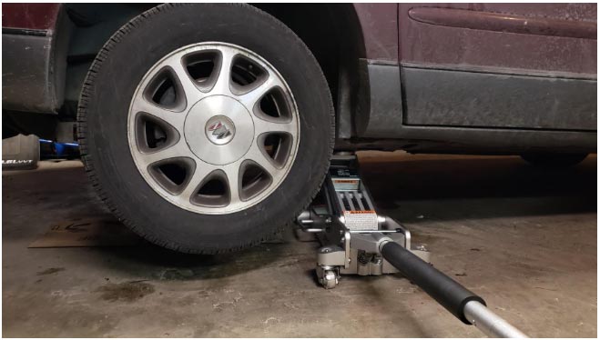 Working-under-the-car with trolley jack